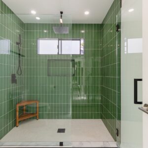 a green tiled shower