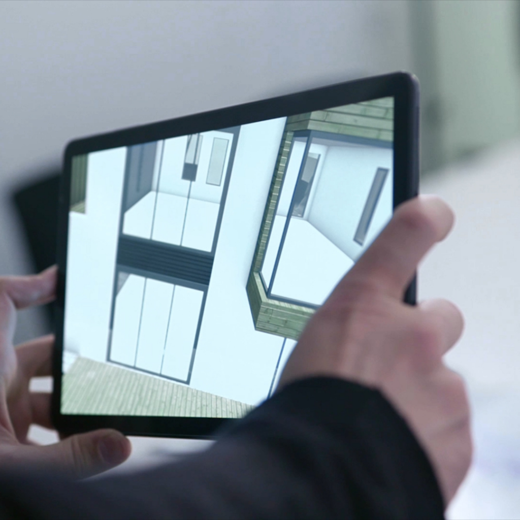 person using a tablet to create a design.